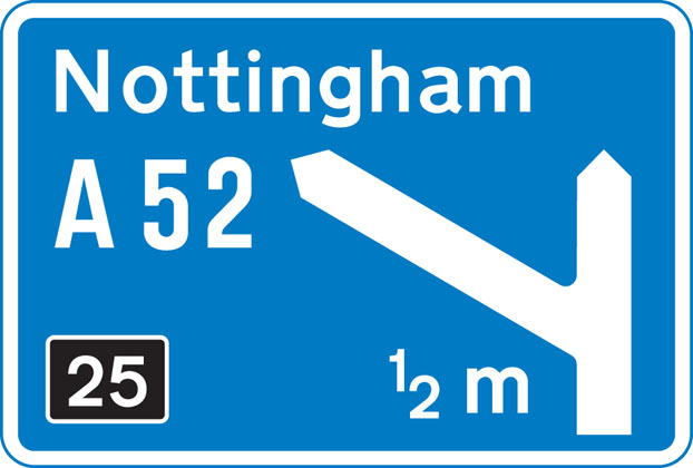 direction-sign-blue-approach-to-junction